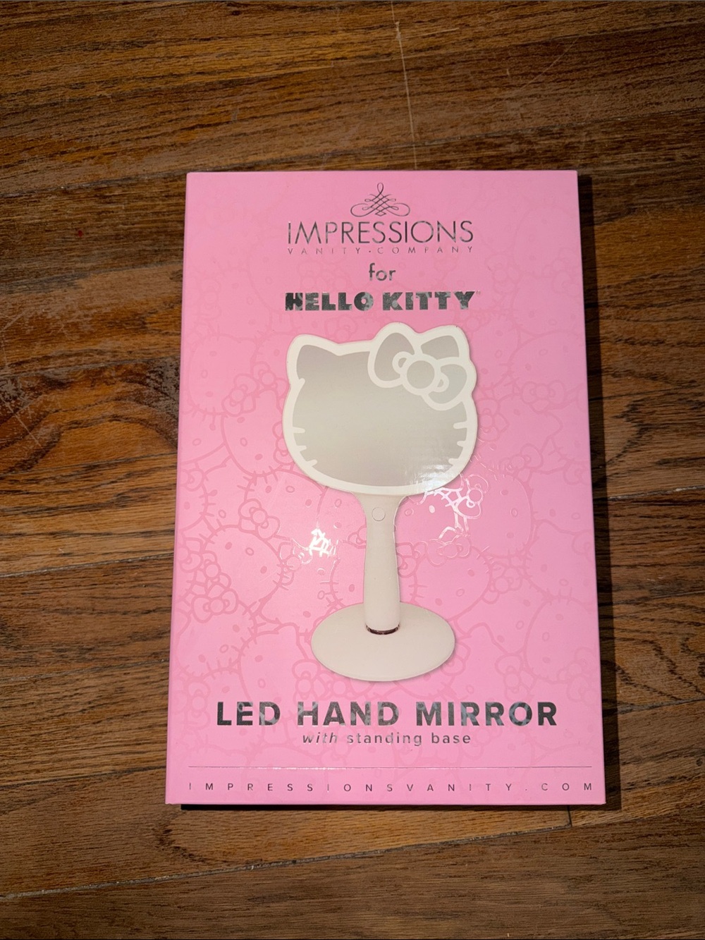 Impressions for Hello Kitty Pink LED Hand Mirror